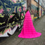 Laura wrapped in hot pink hoverquilt by graffiti wall urban