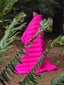 Laura wearing hot pink hoverquilt in oregon forest